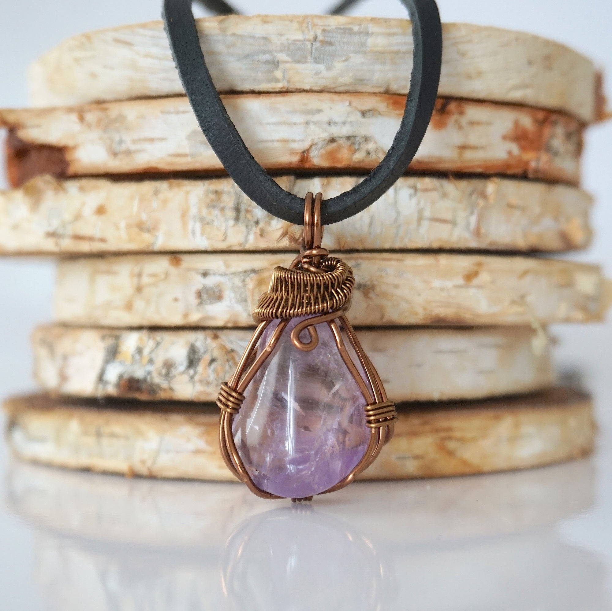 Amethyst necklace for men — handmade bronze copper wire wrapped pendant on black leather cord, February birthstone, by Designs by Nature Gems