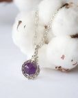 Back side angle of women’s amethyst necklace, 8mm amethyst bead, artisan silver plated copper wire wrap