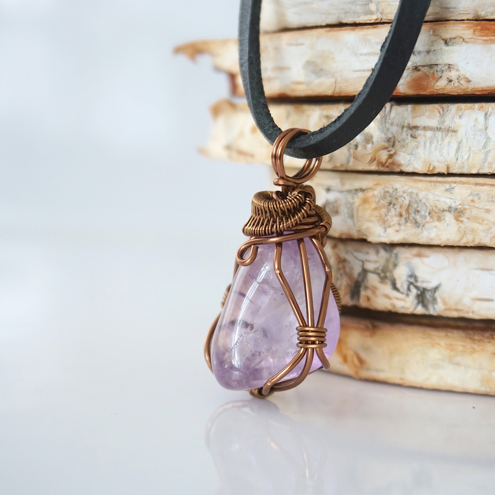 Left side detail of mens amethyst pendant — intricate bronze copper finish wire weaving technique, nickel-free wire, handcrafted artisan wire wrapped jewelry, Designs by Nature Gems