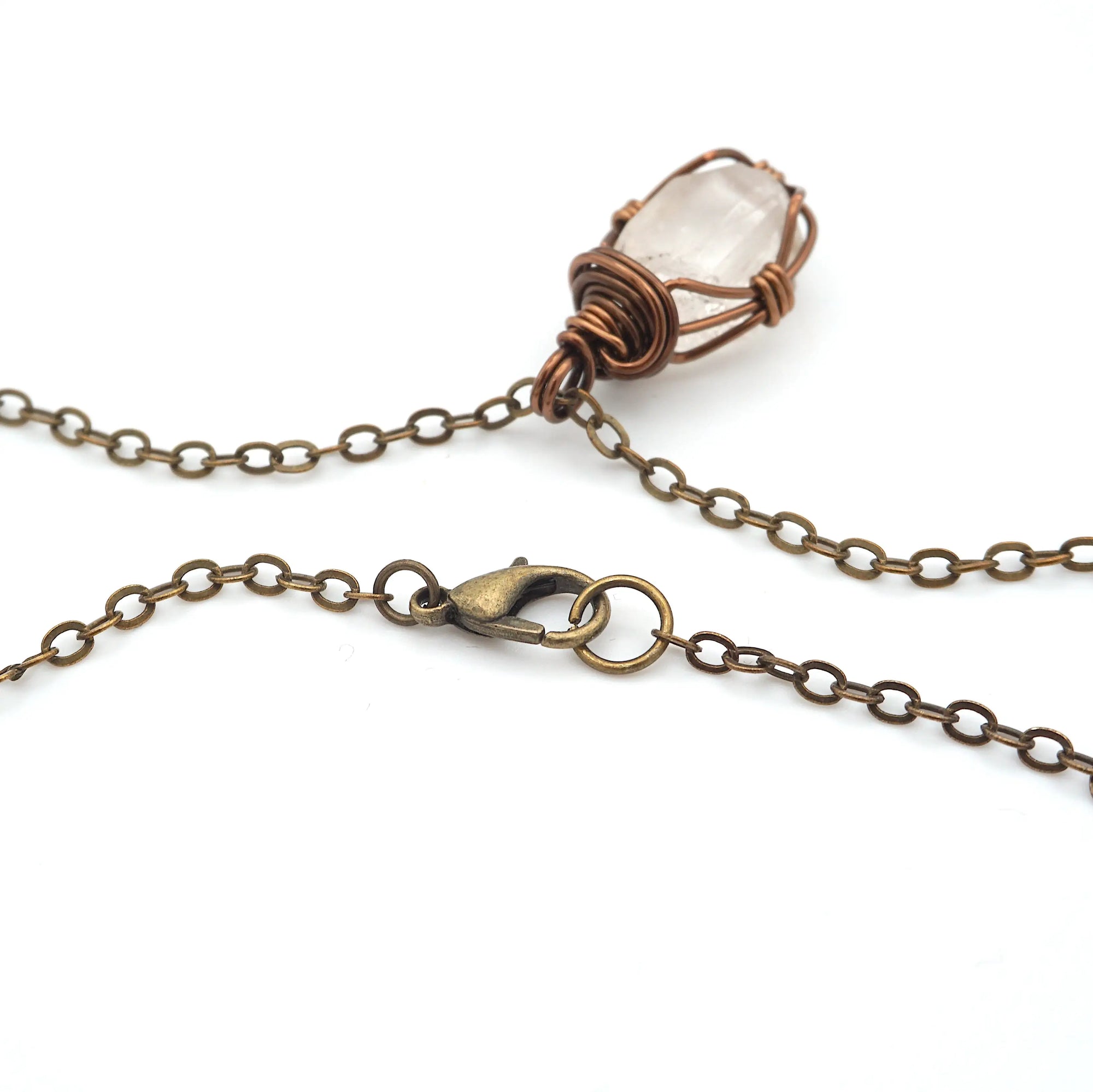 Detail of antique bronze cable chain and lobster clasp closure on handmade Herkimer diamond necklace.