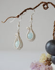 Aquamarine drop earrings with detailed artisan wire wrapping, polished 8mm genuine aquamarine bead, soft silver finish, Designs by Nature Gems