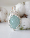 Detailed front angle of aquamarine pendant necklace for women, artisan wire wrapped, soft silver finish