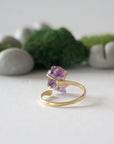 Back view of adjustable 14k gold vermeil ring with natural raw amethyst stone in claw setting
