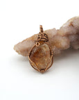 Raw citrine necklace wire wrapped in antique bronze copper on white background - handmade crystal pendant jewelry for women