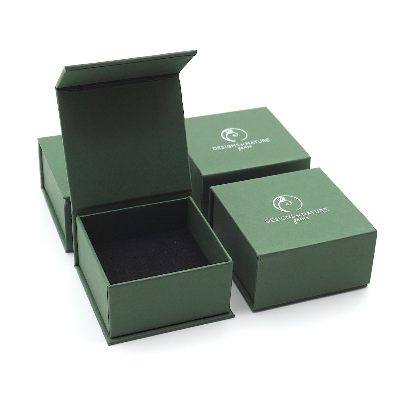Designs by Nature Gems branded jewelry box packaging for adjustable raw rainbow moonstone ring in 14k gold vermeil, gift-ready.