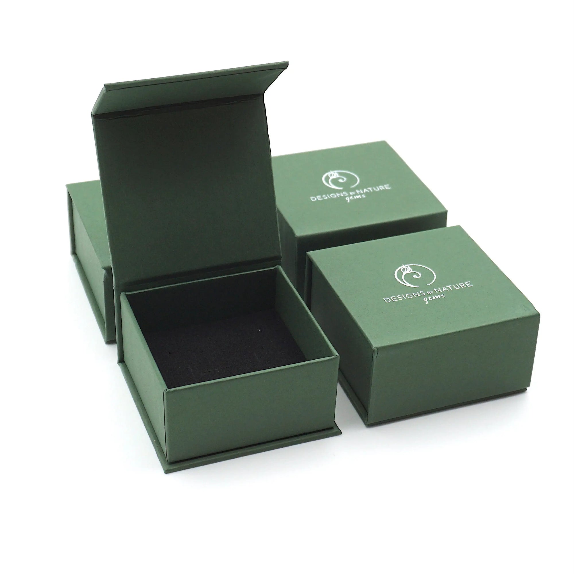 Branded Designs by Nature Gems jewelry box packaging for handcrafted minimalist emerald ring.