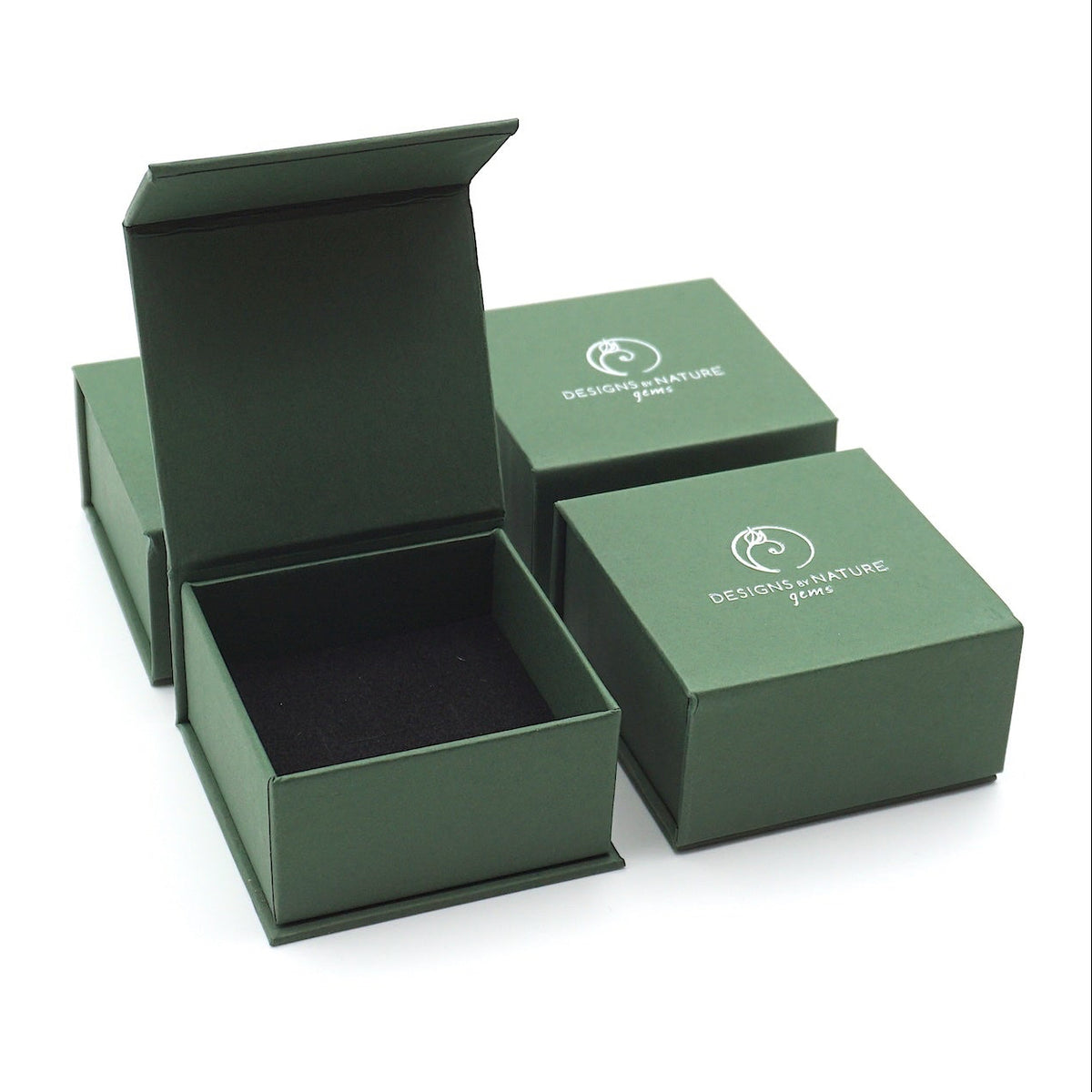 Designs by Nature Gems branded jewelry box packaging for minimalist rainbow moonstone necklace, ready for gifting.