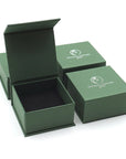 Designs by Nature Gems branded jewelry box packaging for amethyst stud earrings, natural dark amethyst stones, sterling silver posts