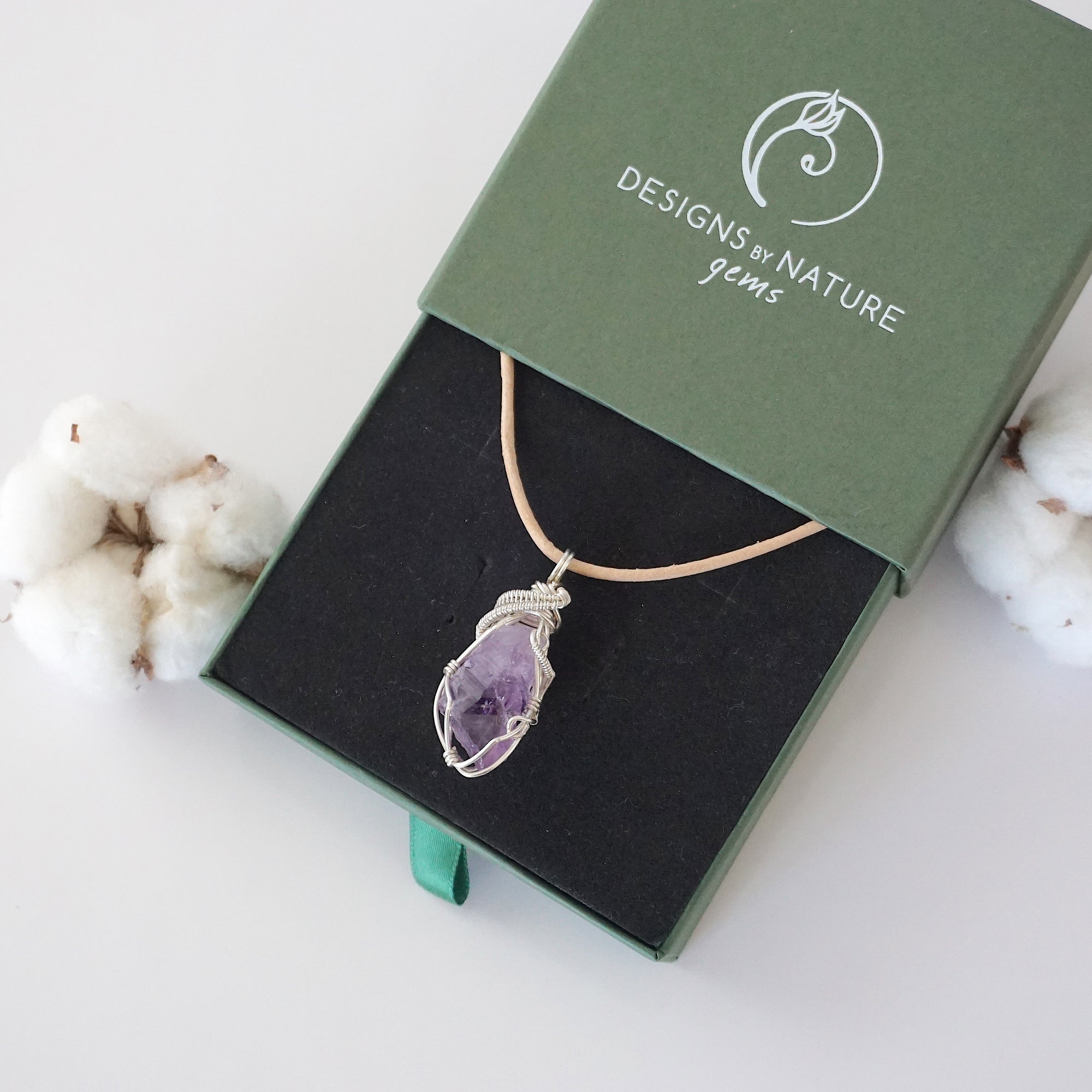 Designs by Nature Gems branded jewelry gift box — raw amethyst necklace arrives in signature packaging, ready to gift, February birthstone gift for women