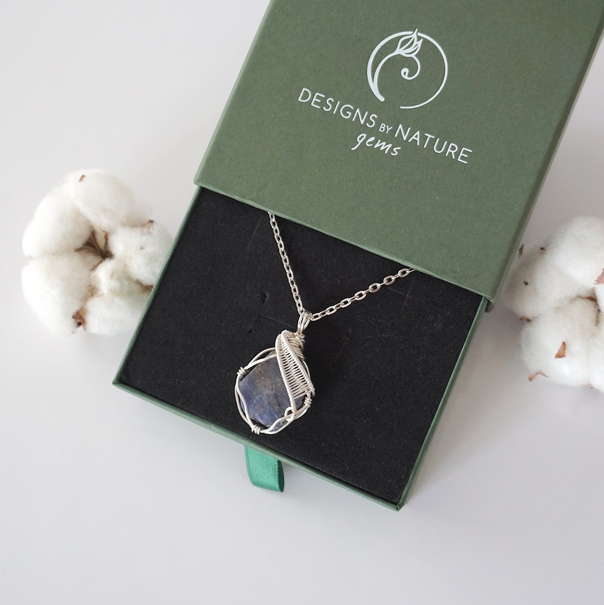 Designs by Nature Gems branded jewelry gift box — raw sapphire silver chain necklace arrives in signature packaging, ready to gift, September birthstone gift for women