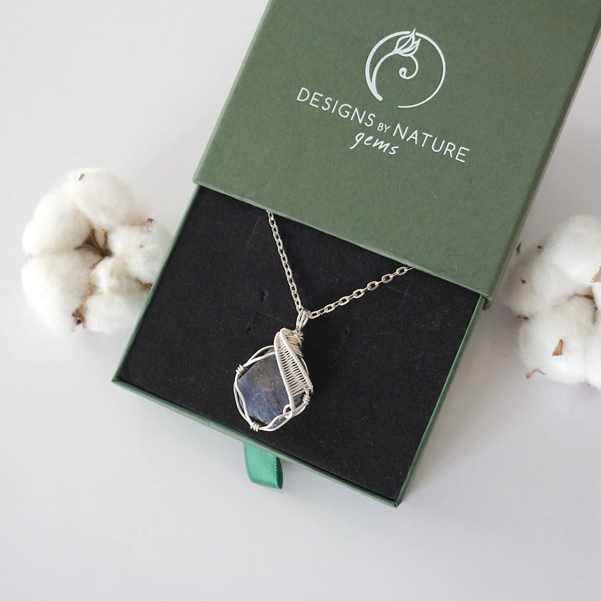 Designs by Nature Gems branded jewelry gift box — raw sapphire silver chain necklace arrives in signature packaging, ready to gift, September birthstone gift for women