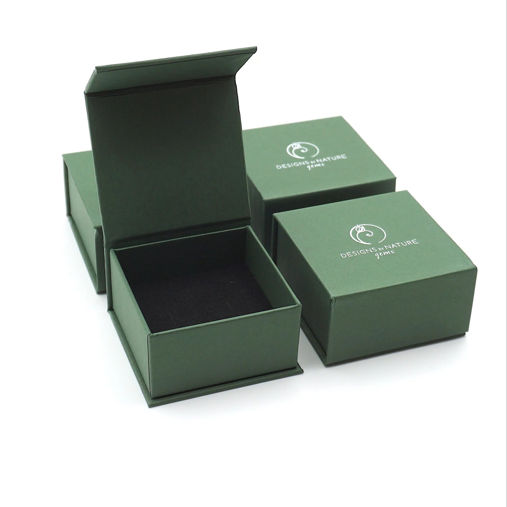 Designs by Nature Gems branded jewelry box packaging for simple amethyst ring (ring not shown)