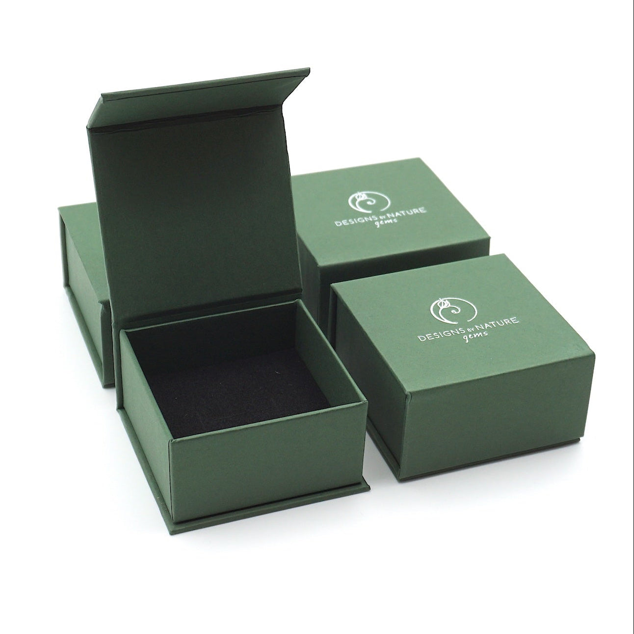 Designs by Nature Gems branded jewelry box packaging for rainbow moonstone and lotus necklace, ready for gifting.