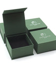 Designs by Nature Gems branded jewelry box packaging for rainbow moonstone and lotus necklace, ready for gifting.