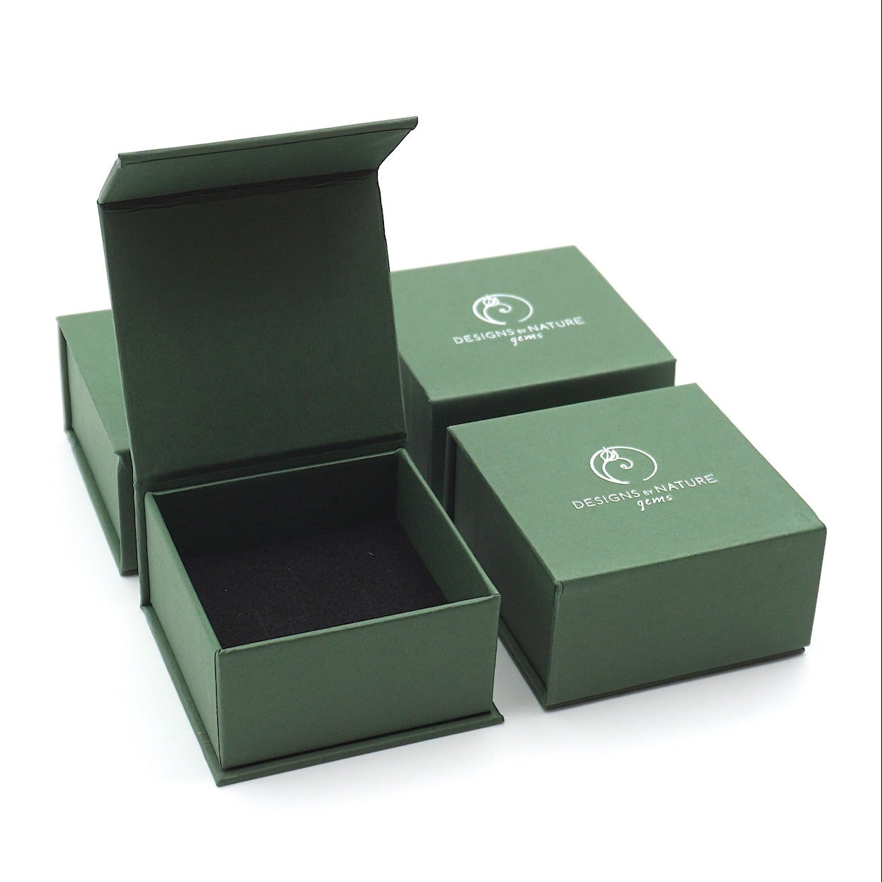 Designs by Nature Gems branded jewelry box packaging for minimalist rainbow moonstone ring, ready for gifting.