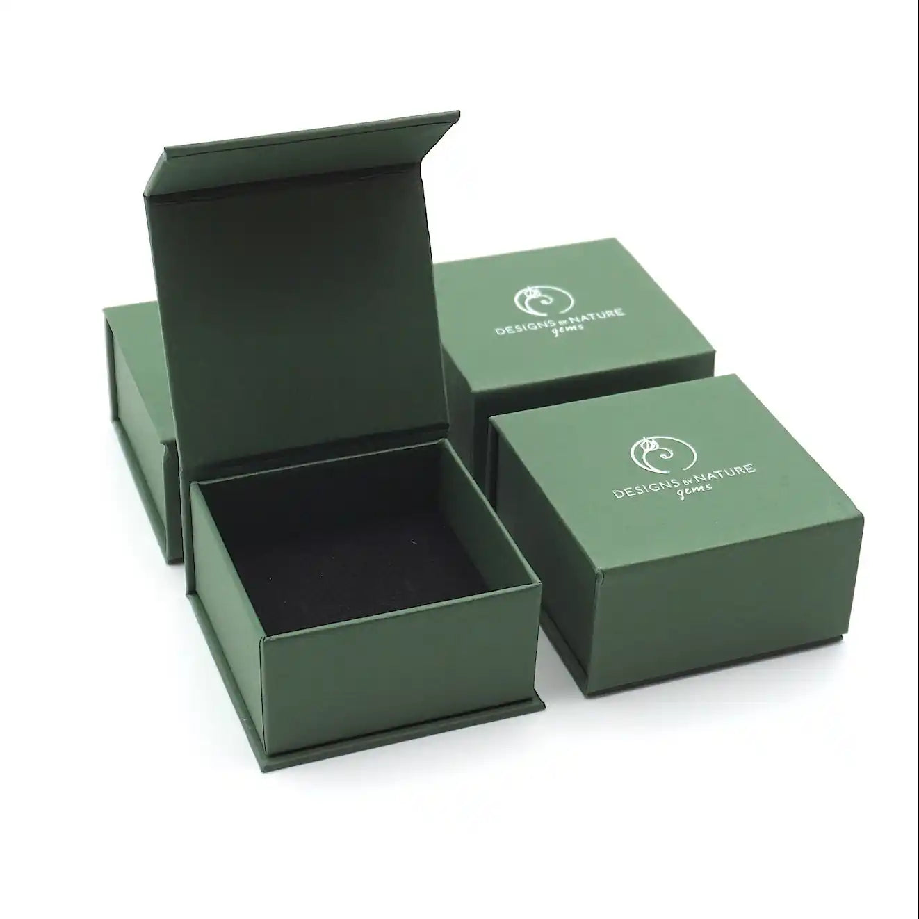 Designs by Nature Gems jewelry box packaging for raw emerald adjustable ring in sterling silver
