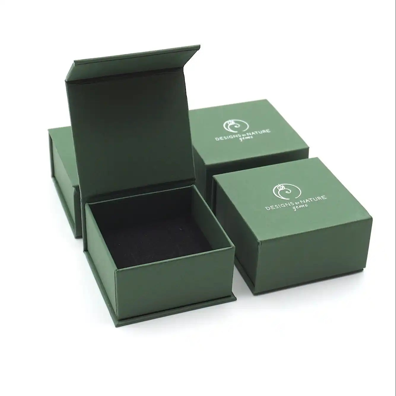 Designs by Nature Gems jewelry box packaging for raw emerald adjustable ring in gold vermeil