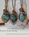 Three raw emerald pendants – showcasing natural variation in size, shape, and green shade, handcrafted unisex birthstone jewelry.