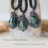 Three emerald pendants for men showing natural variation in emerald size, shape, and green colour in antiqued sterling silver wrapping