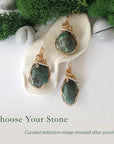 Three emerald pendants for women showing natural variation in emerald size, shape, and green colour with 14k gold filled and sterling silver wire wrapping