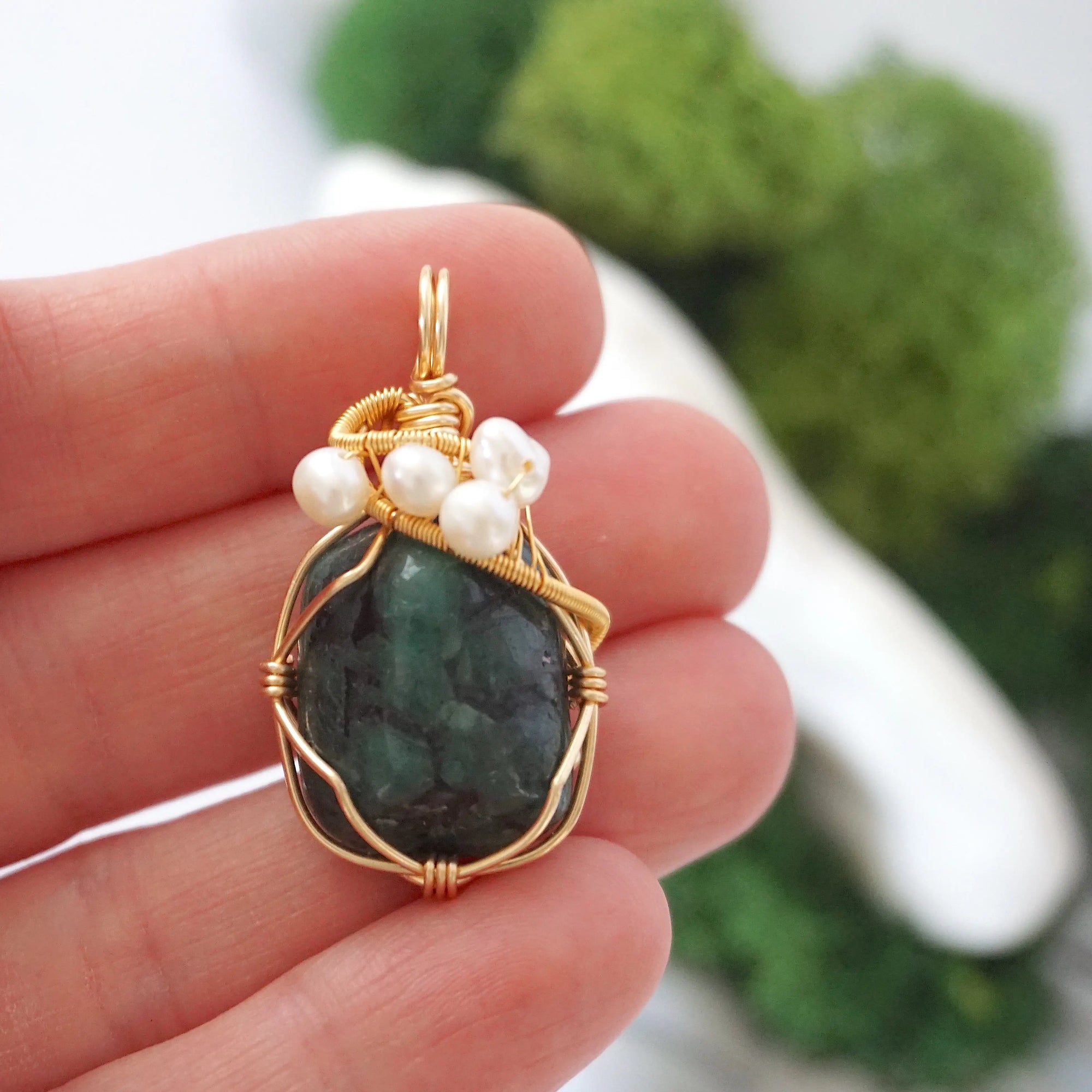 Emerald and freshwater pearl necklace pendant in hand for size reference, artisan birthstone jewelry gift for her