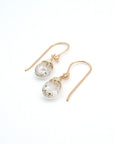 Angled look at herkimer diamond drop earrings, artisan wire wrapping in 14k gold filled, April birthstone
