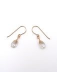 Side angle of herkimer diamond drop earrings, minimalist artisan wire wrapping, 14k gold filled