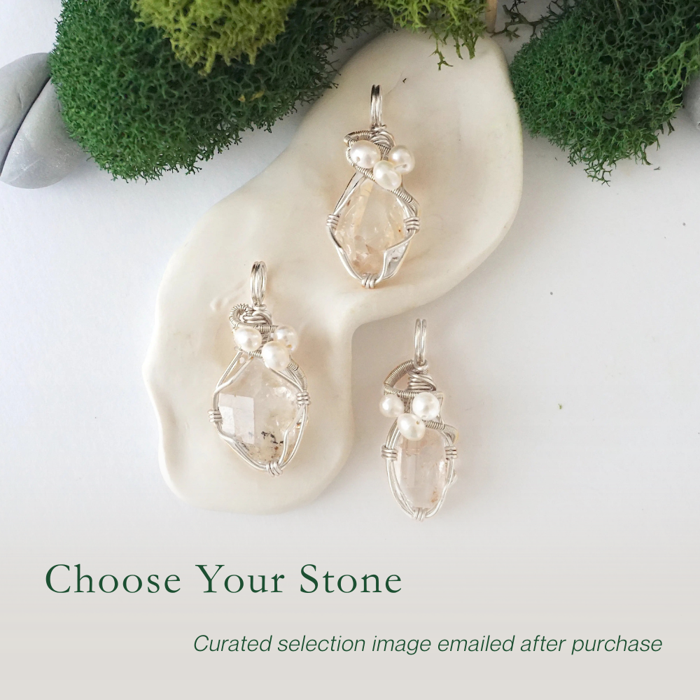 Three silver wire wrapped herkimer diamond and freshwater pearl pendants showing natural stone variation, artisan jewelry for women