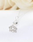 Angled detail of Herkimer diamond and lotus necklace showing handcrafted artisan design in 925 sterling silver.