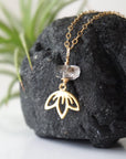 Left angle detail of Herkimer diamond and lotus necklace showing artisan design in gold vermeil.