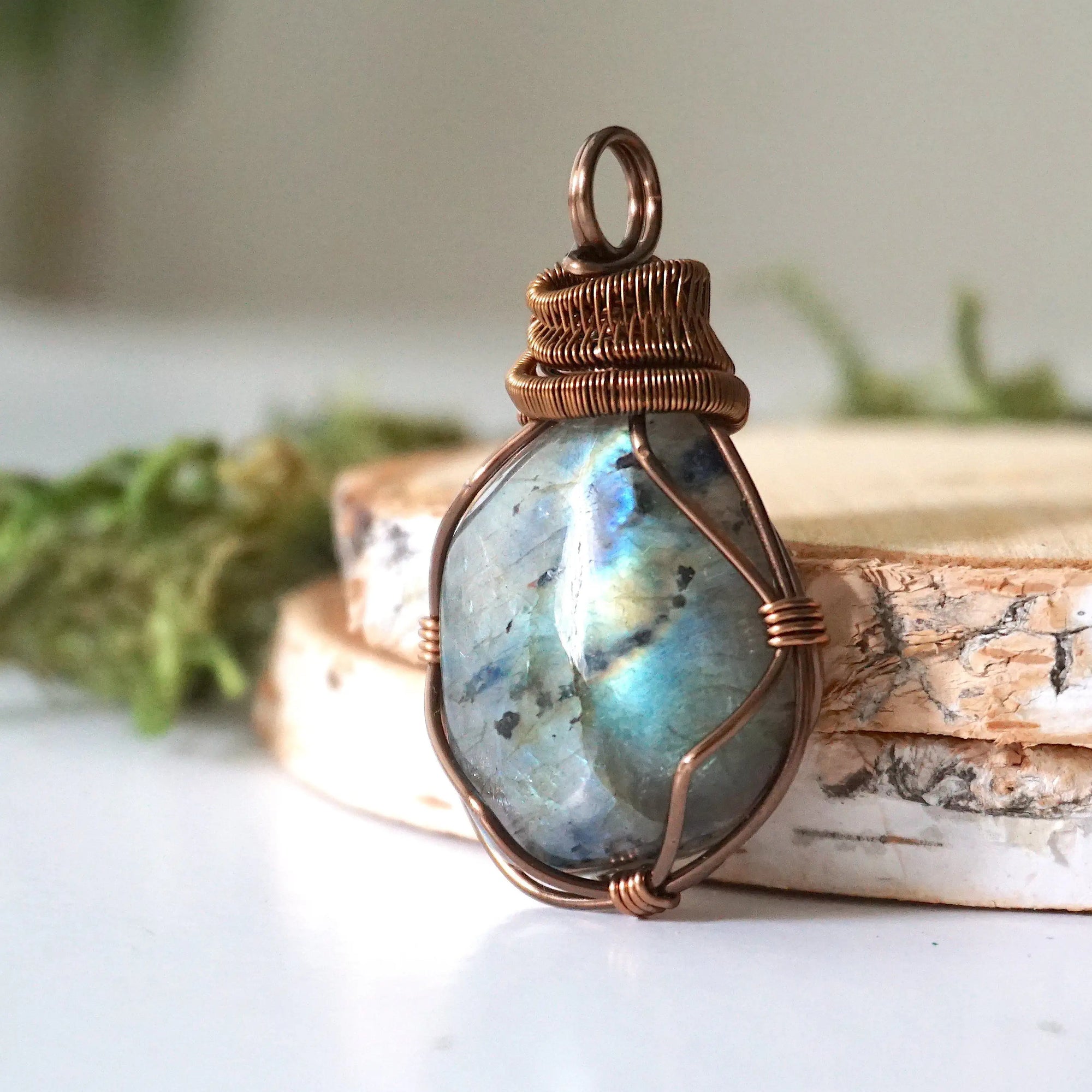 Left side view of labradorite pendant — antique bronze wire wrapping detail, wire wrapped crystal pendant for women