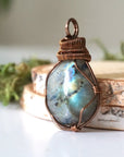 Left side view of labradorite pendant — antique bronze wire wrapping detail, wire wrapped crystal pendant for women