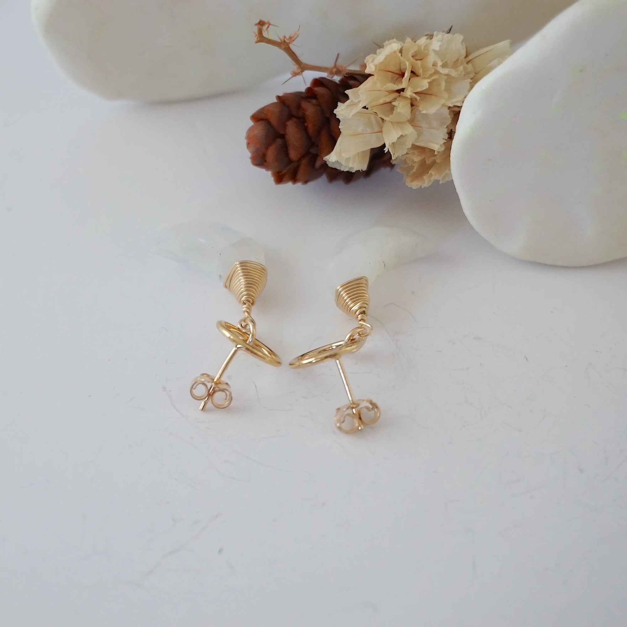Detailed close-up of open circle stud earring closure, Lux Rainbow Moonstone Moon Stud Earrings, 14k gold filled, handmade craftsmanship.