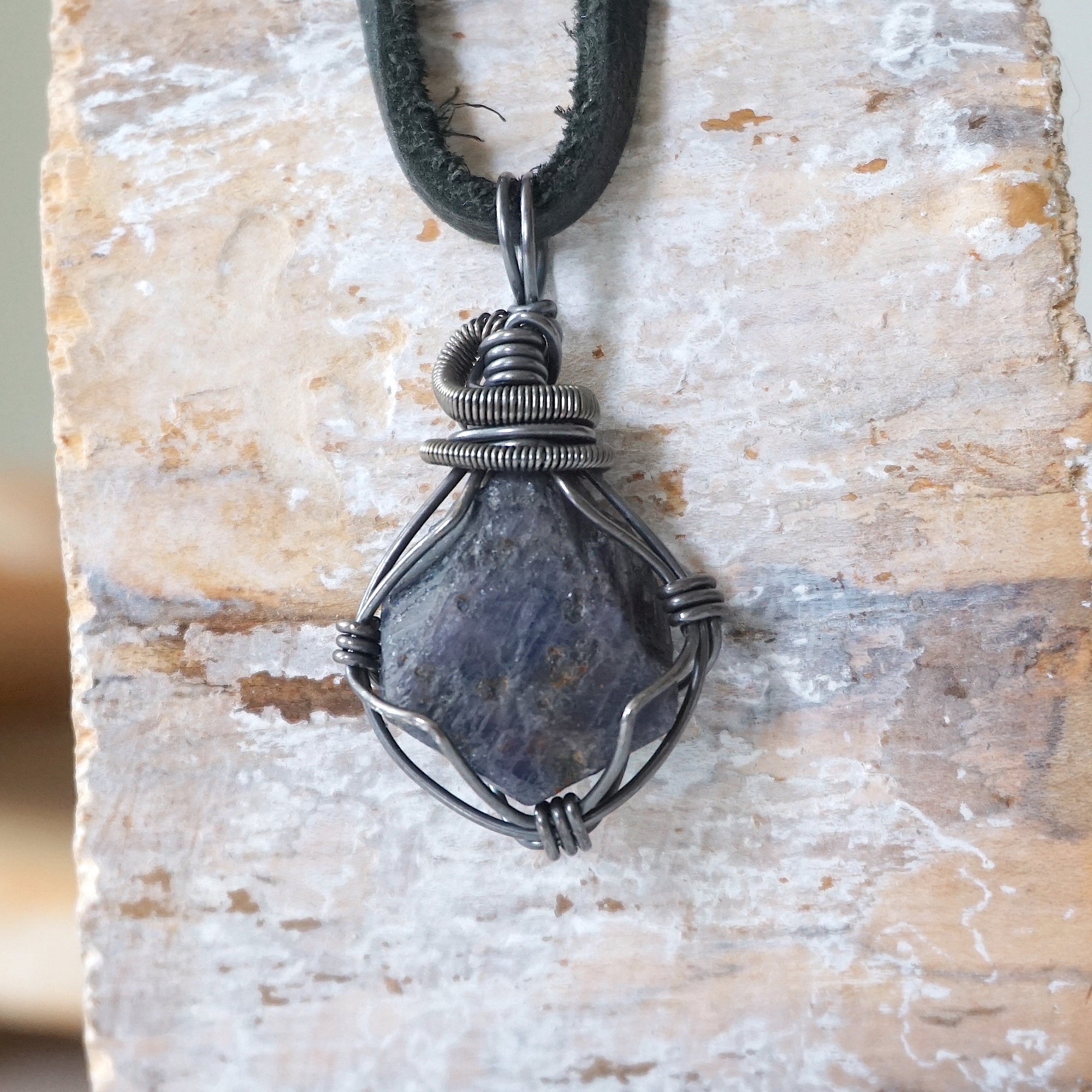Men's raw sapphire necklace on genuine black leather cord — antiqued 925 sterling silver wire wrap, handcrafted crystal jewelry by Designs by Nature Gems