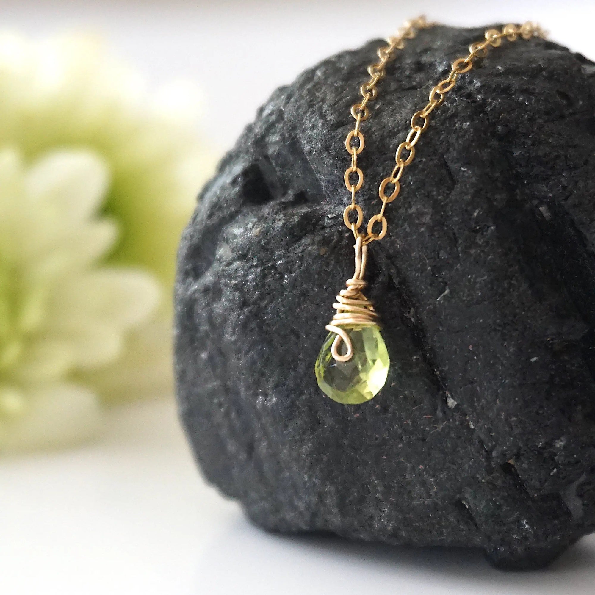 Left side detail of minimalist peridot pendant — 14k gold filled wire wrap and faceted natural peridot crystal, artisan dainty necklace for women, August birthstone jewelry