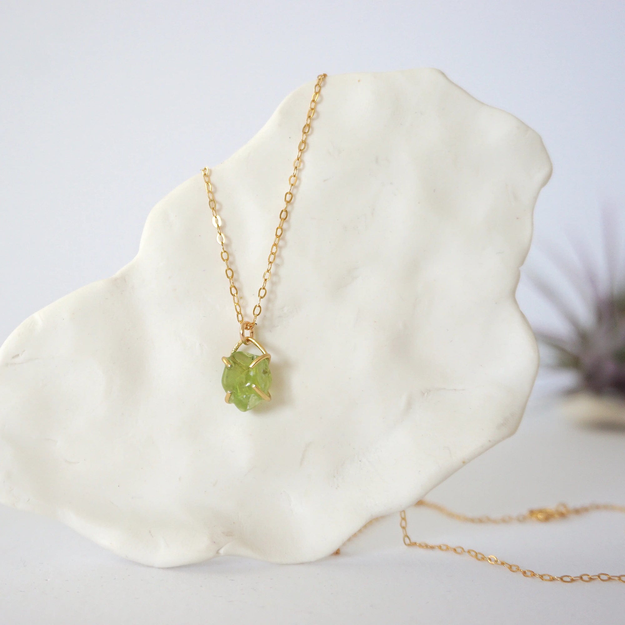 Minimalist raw peridot necklace for women — vivid olive green crystal in gold vermeil four-prong setting on 14k gold filled chain, dainty August birthstone jewelry by Designs by Nature Gems