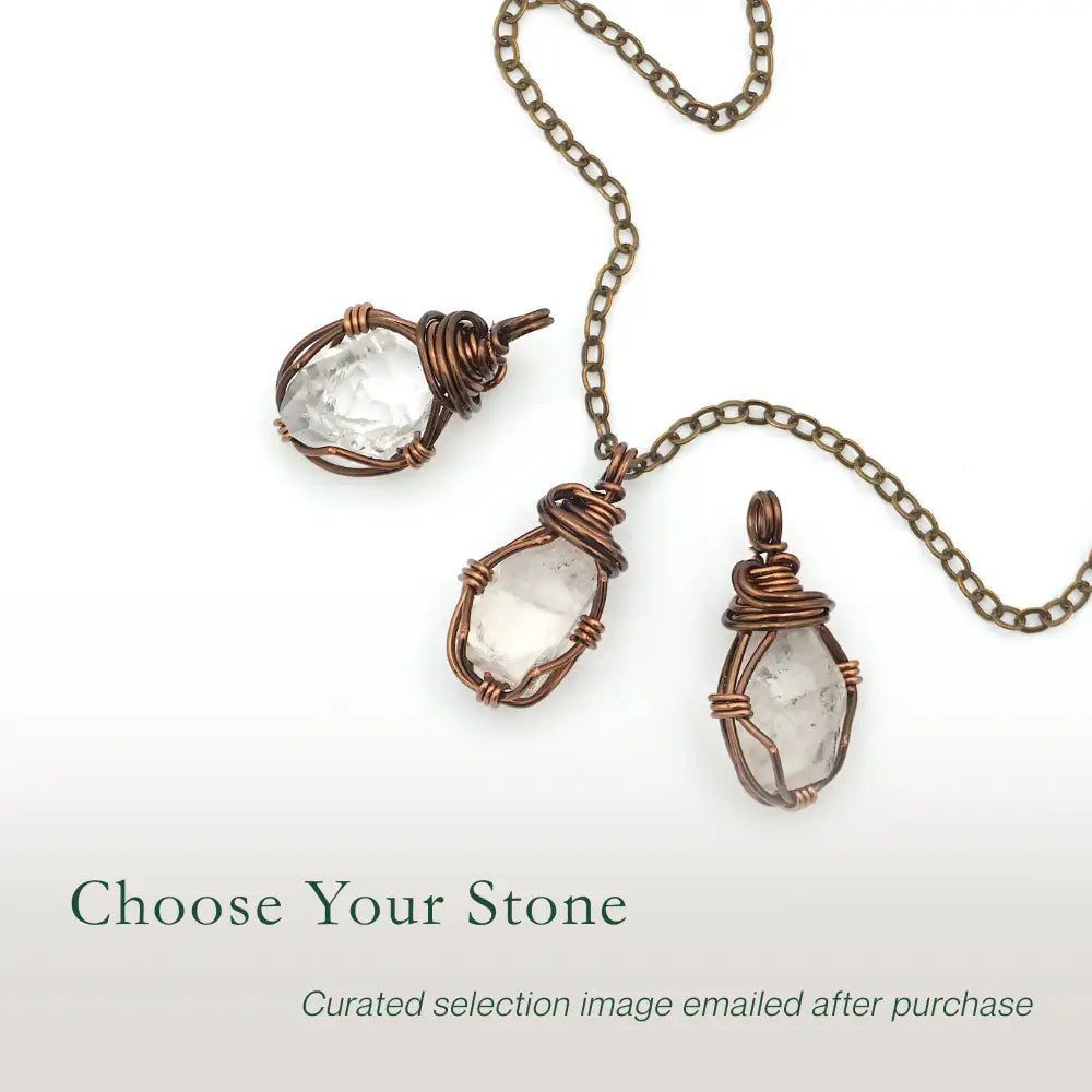 Three raw Herkimer diamond pendants showing natural variation in crystal size, shape, and handcrafted wire wrapping.