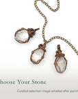 Three raw Herkimer diamond pendants showing natural variation in crystal size, shape, and handcrafted wire wrapping.