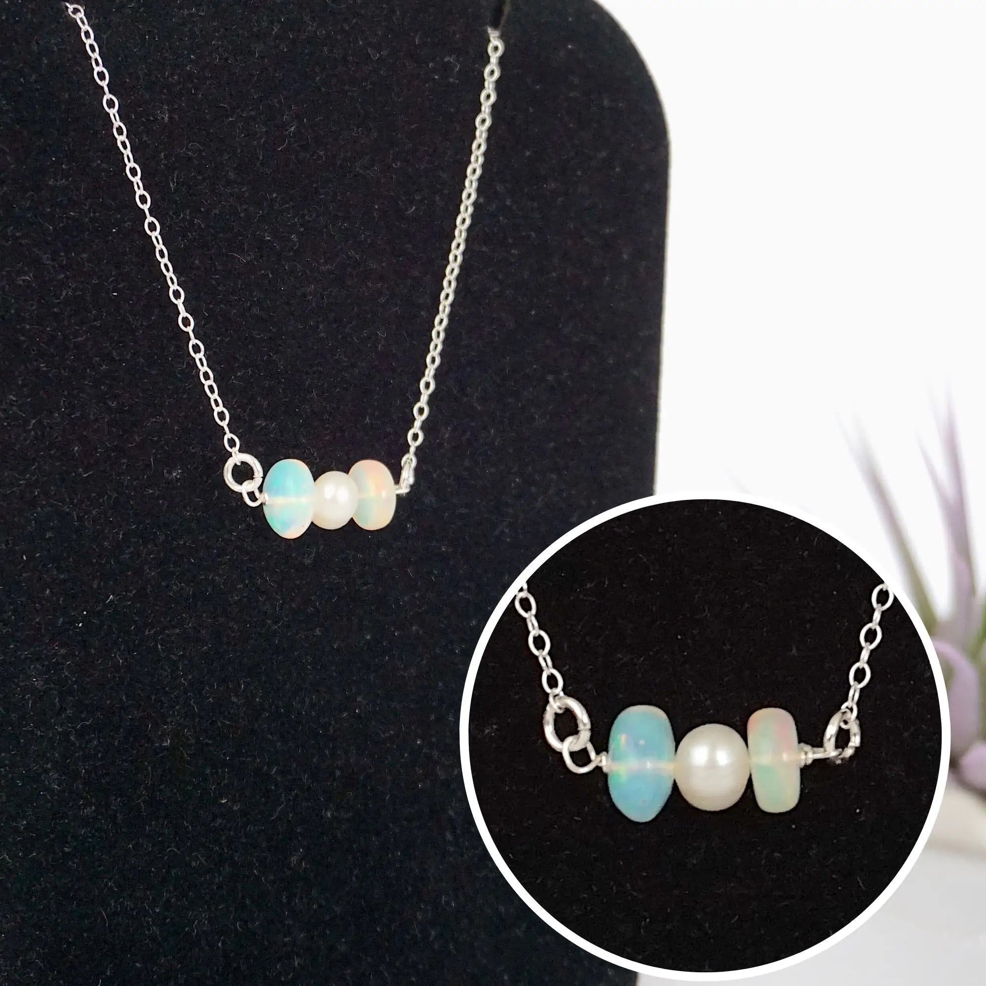 Close-up of raw opal stones and freshwater pearl bar on 925 sterling silver necklace