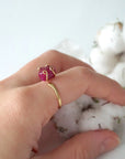 Pink ruby adjustable ring in 14k gold vermeil worn on female model's hand — raw crystal ring for women, one of a kind by nature