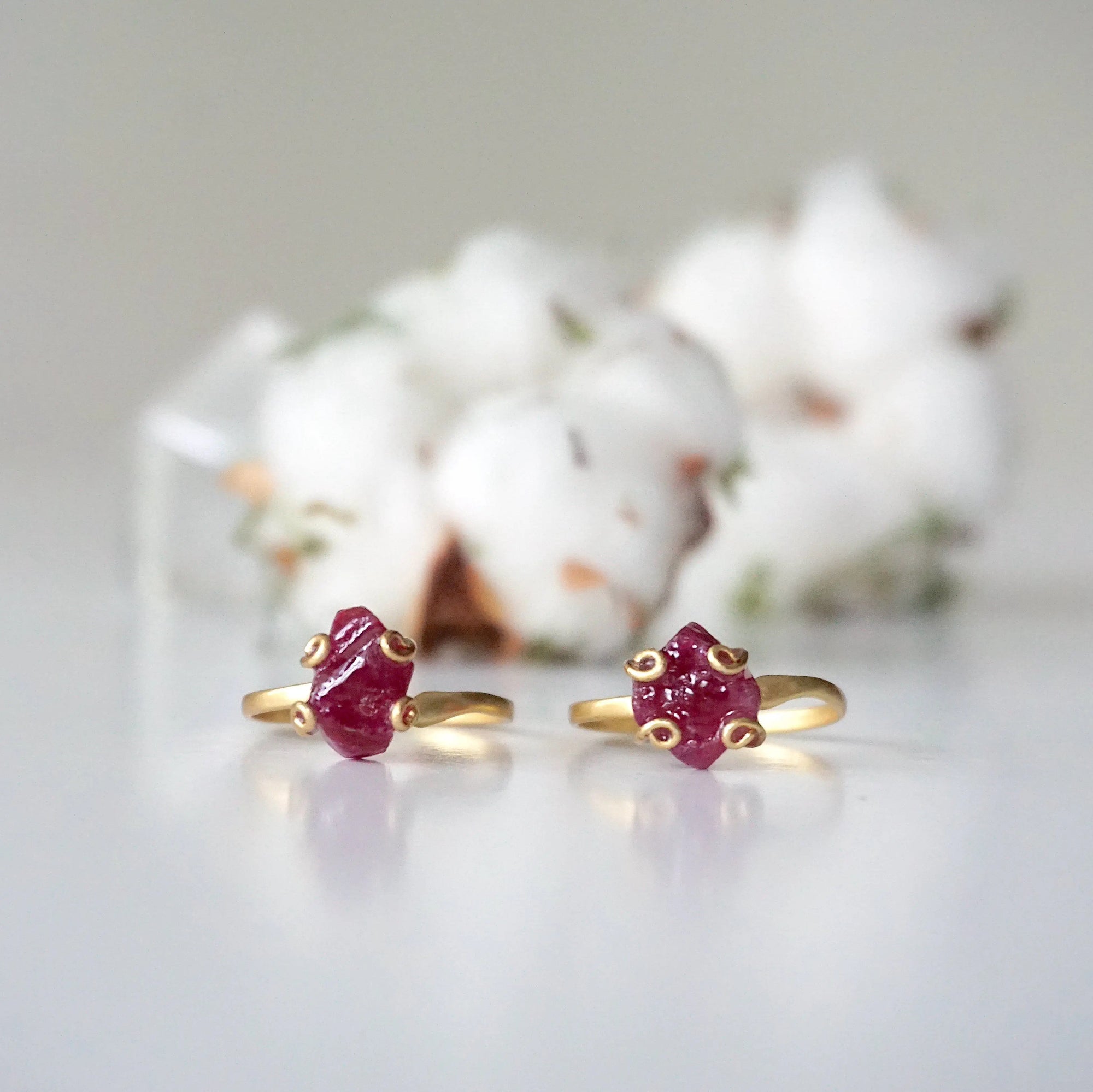 Two pink ruby adjustable rings in 14k gold vermeil showing natural variation in stone size, shape, and colour — choose your ruby ring