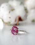 Left side view of pink ruby adjustable ring highlighting natural raw stone and slim 925 sterling silver band — July birthstone ring