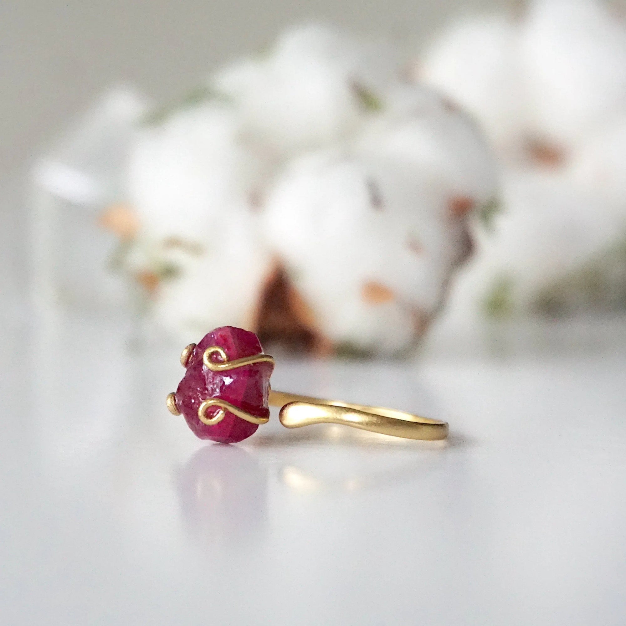 Right side view of raw pink ruby adjustable ring showing 14k gold vermeil band and stone setting — minimalist natural crystal ring for women