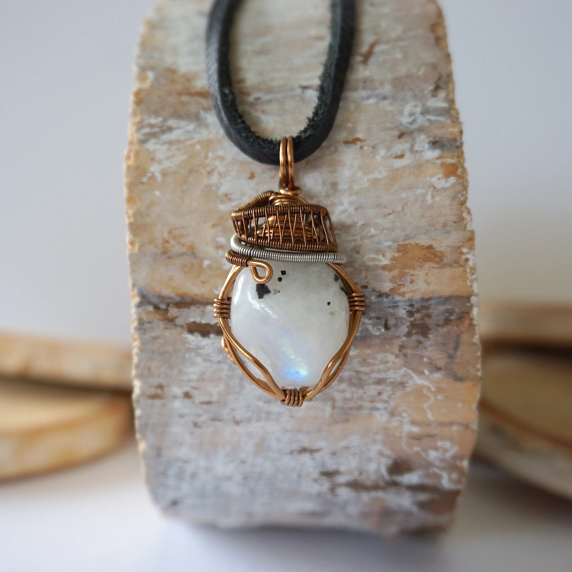 Rainbow moonstone necklace for men with antique bronze and dark silver wire wrapped June birthstone pendant on black leather cord