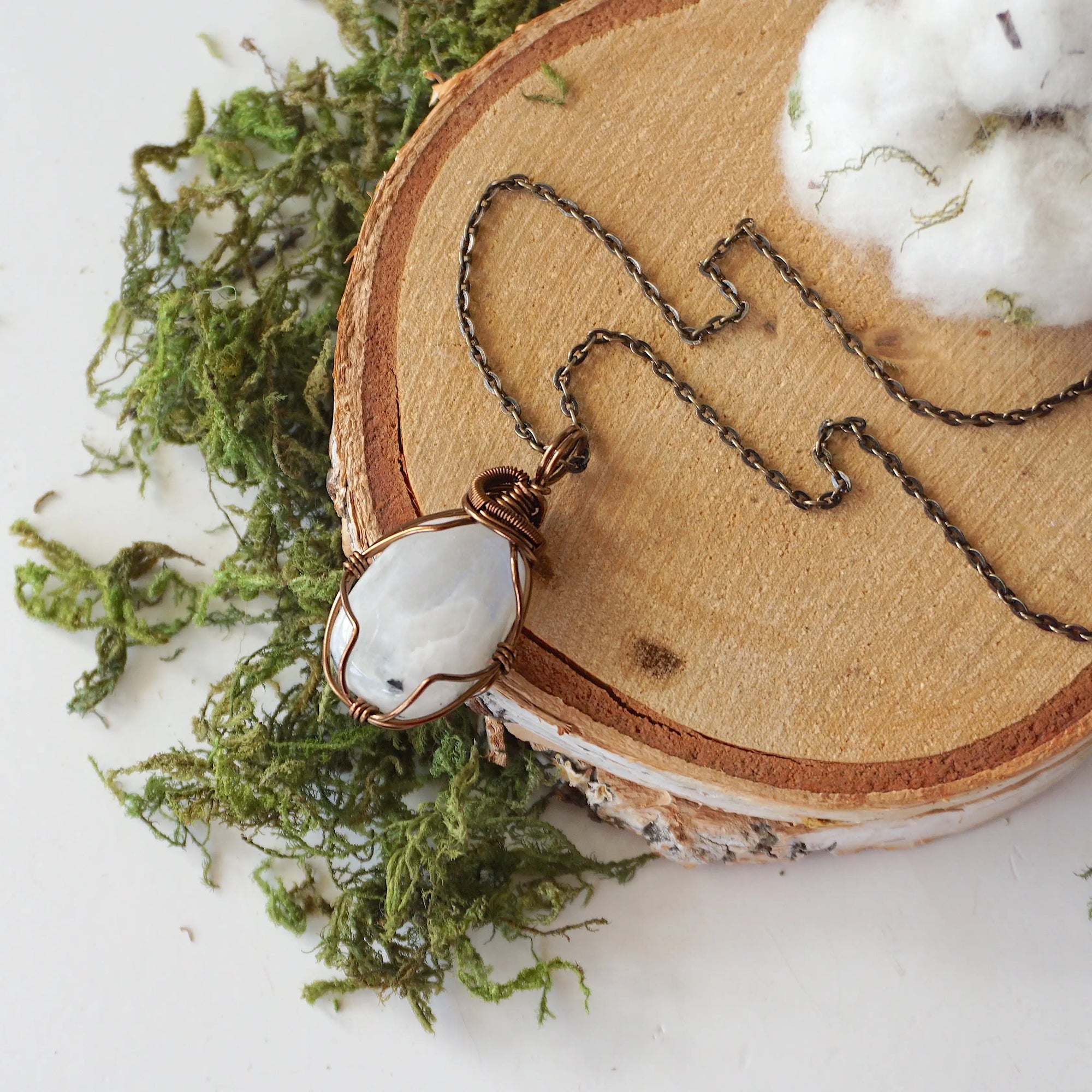 Women’s rainbow moonstone necklace with natural polished-raw pendant, antique bronze copper wire wrap and antique bronze cable chain