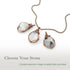 Three rainbow moonstone pendants showing natural variation in size shape and colour in handcrafted artisan jewelry