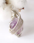 Right side angle of raw amethyst pendant, natural amethyst crystal, sterling silver artisan wire wrap