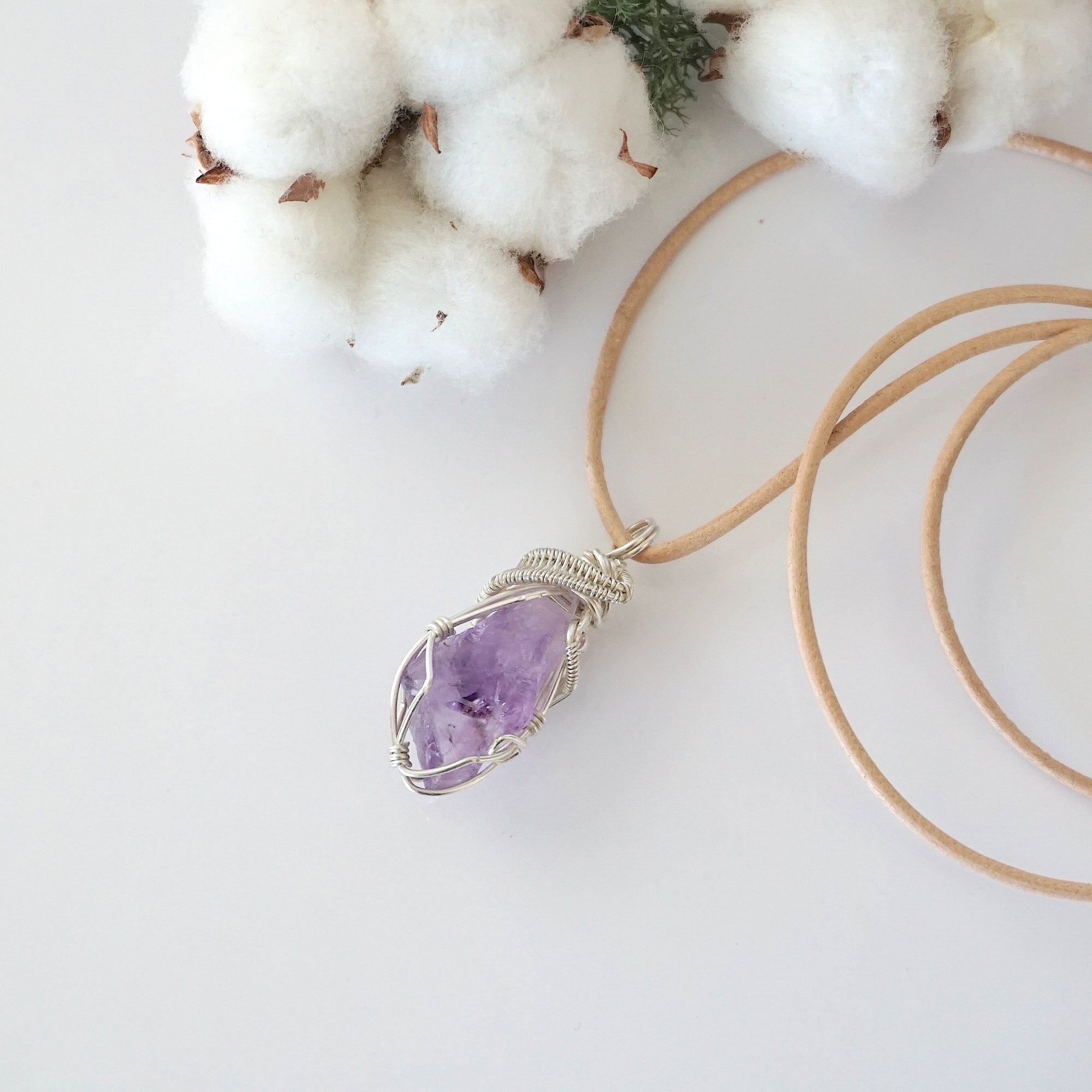 Raw amethyst necklace for women — handmade 925 sterling silver wire wrapped pendant on genuine tan leather cord, February birthstone, by Designs by Nature Gems
