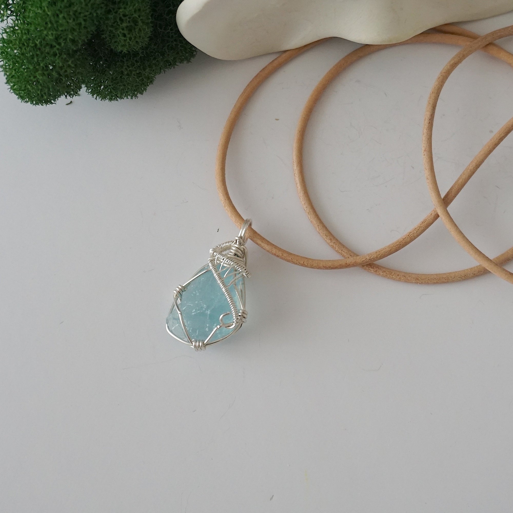 Raw aquamarine necklace for women — handmade 925 sterling silver wire wrapped pendant on genuine tan leather cord, March birthstone, by Designs by Nature Gems