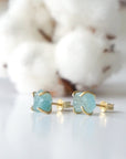 Left side angle of raw aquamarine stud earrings, genuine gemstone in 14k gold vermeil, Designs by Nature Gems